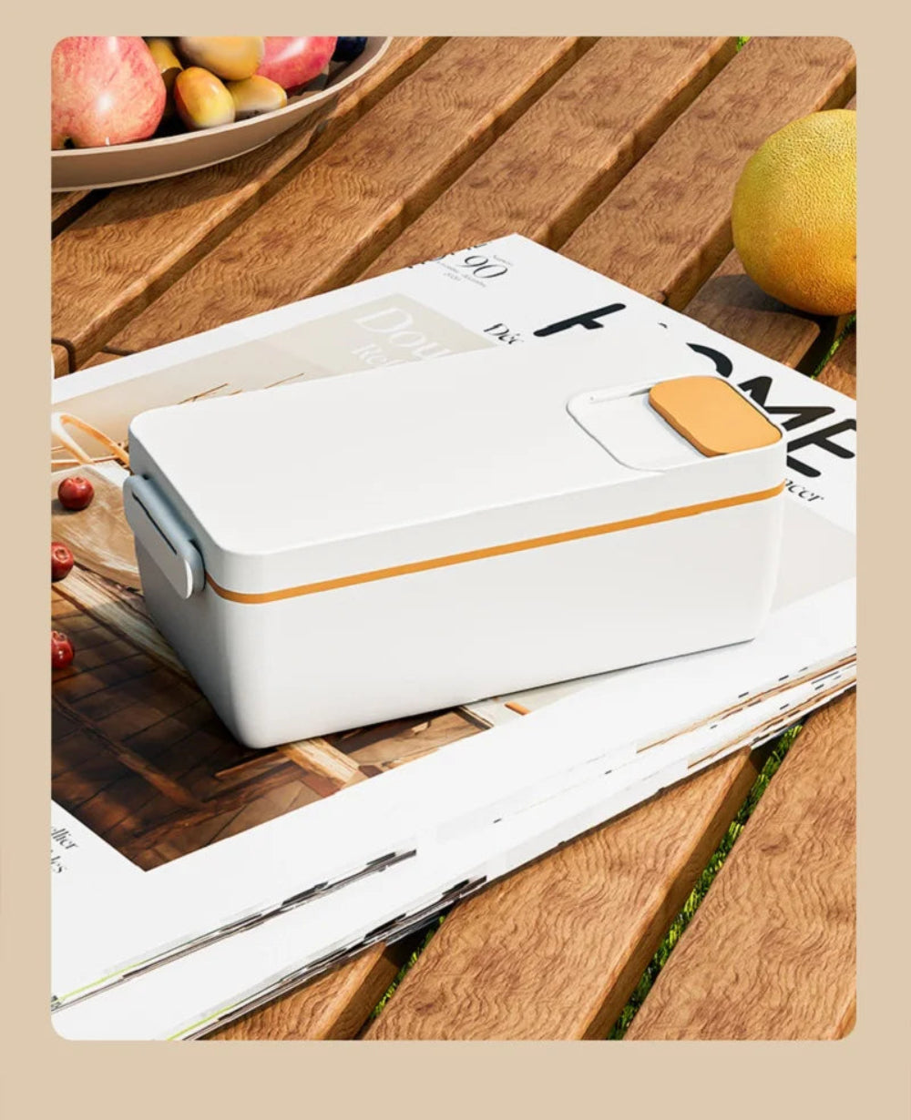 Smart Lunchbox Lite with wireless heating and USB-C charging, 1L capacity. Sleek white design with gold accents, perfect for hot meals on the go.