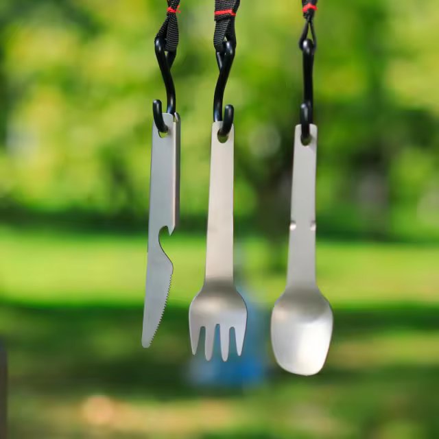 Titanium travel fork set featuring a lightweight, durable fork, knife, and spoon. Perfect for camping, travel, and outdoor dining convenience.